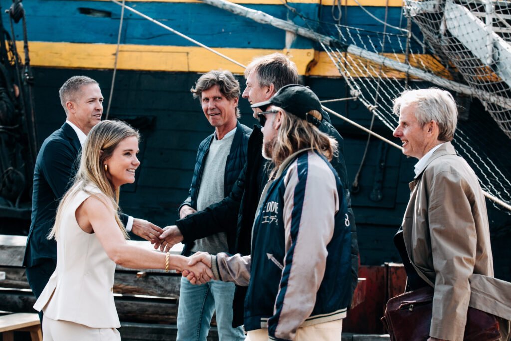 Group of business people networking – Tangen corporate culture.